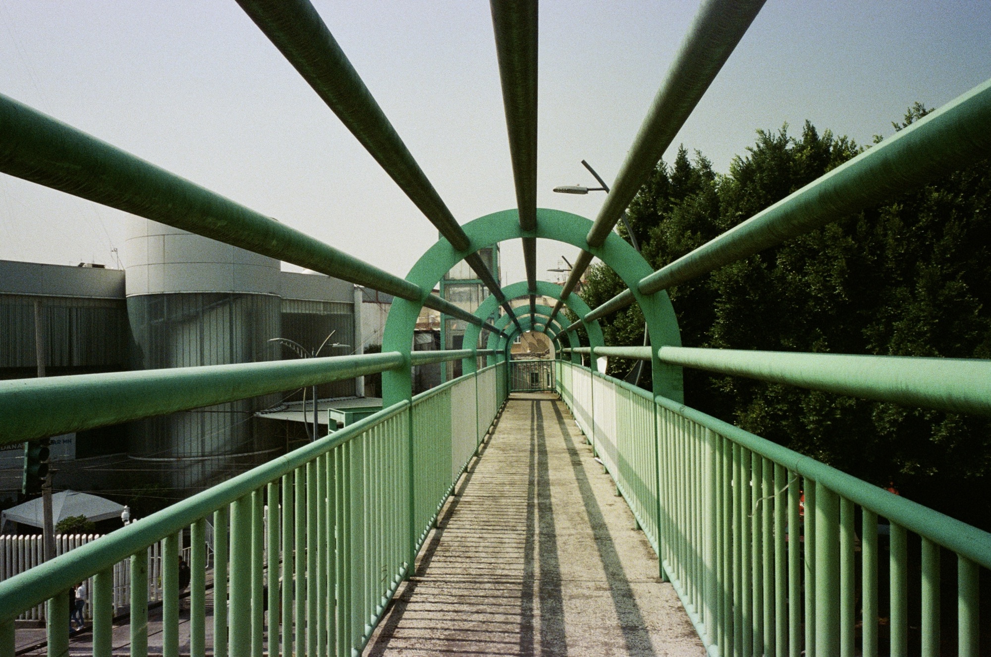 Photograph of a pedestrian bridge with a green frame around it